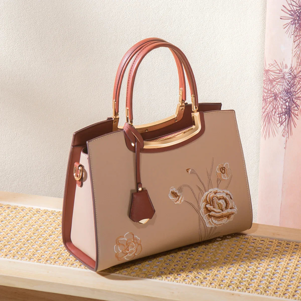 Luxury neutral handbag with embroidery