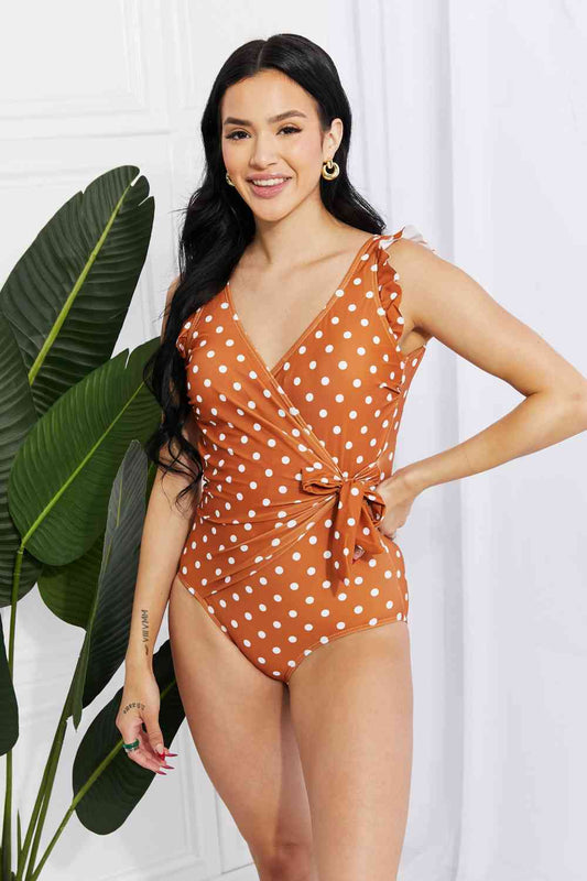 One-piece polka dot swim suit