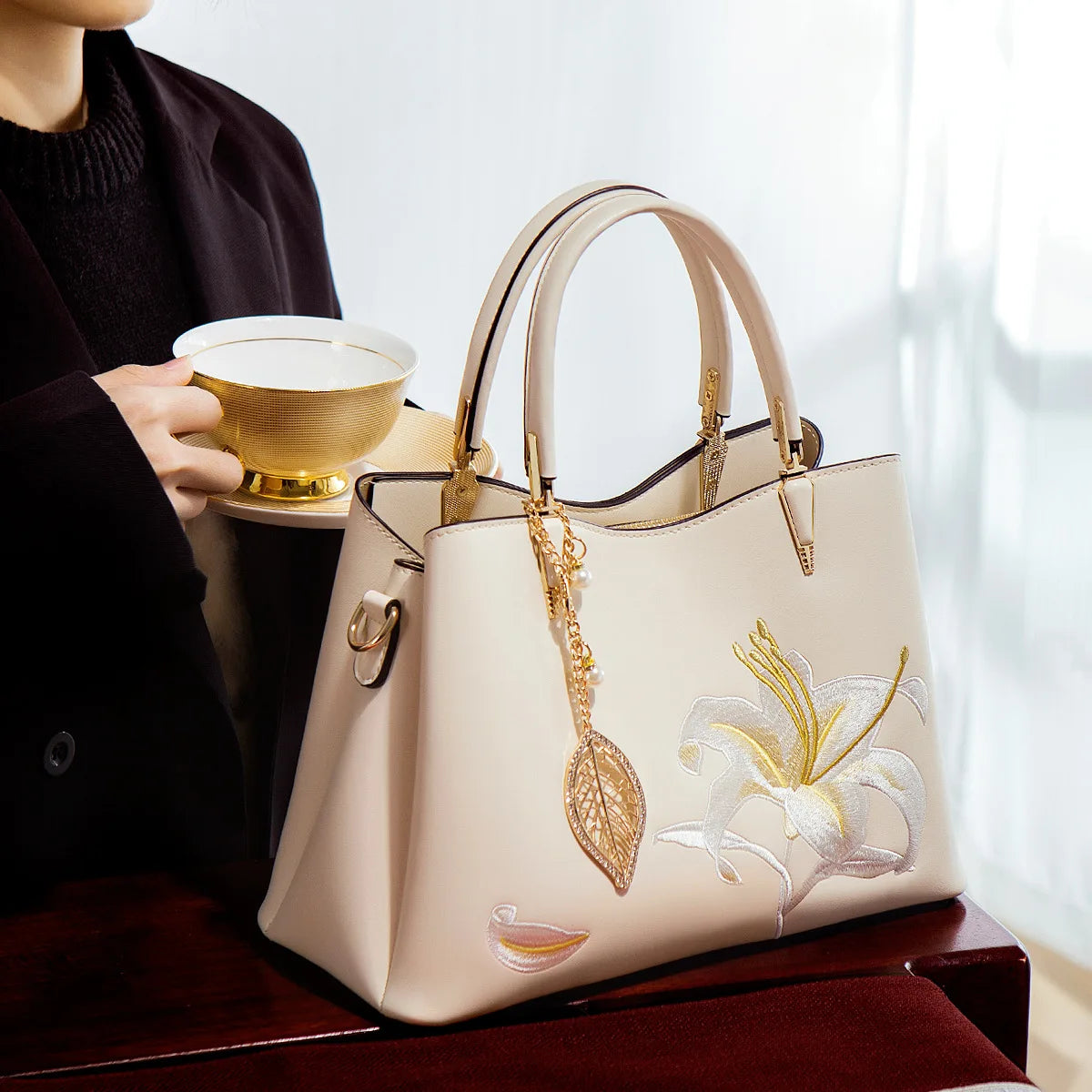 Elegant handbag with neutral color embroidery