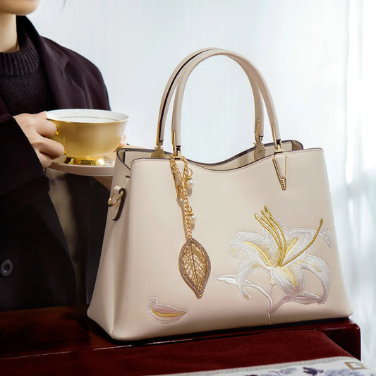 Elegant handbag with neutral color embroidery