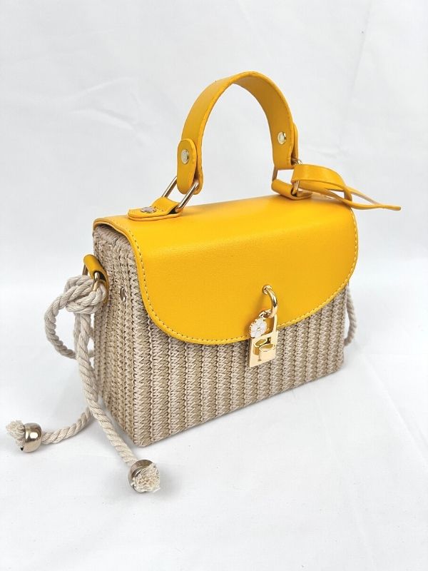 Shoulder and crossbody rattan mini bag